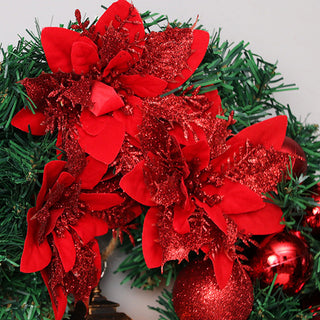 Roter Weihnachtskranz mit LED-Laterne