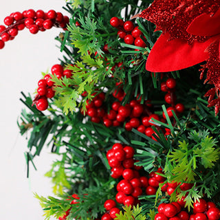 Roter Weihnachtskranz mit LED-Laterne
