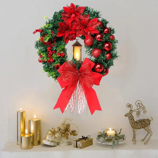 Roter Weihnachtskranz mit LED-Laterne